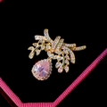 Élégante broche nœud dorée avec cristaux et une grande pierre rose en forme de goutte - Style Nœud Feuille Goutte Rose (B882)