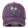 Close-up of daffodil embroidery on washed purple cotton baseball cap with vintage finish - Purple