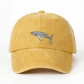Detail of whale embroidery on ginger yellow washed cotton baseball cap with curved brim - Yellow