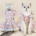 Floral pet cat dress with blue and red patterns and delicate white lace trim on hem - XS / Little Red Flower