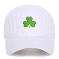 White washed cotton baseball cap featuring green clover embroidery and a curved brim - White