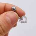 Close-up of a silver stainless steel heart belly ring with sparkling zircons - Silver Heart Prong Setting Style (JE0428B)