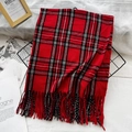 Plaid tassel scarf in red black and white checkers on a classic metal stand - Christmas Red