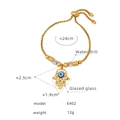 Bracciale Mano di Fatima dorata con occhio blu e cristalli d'acqua scintillanti - Mano di Fatima (E402) / Oro