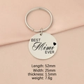 Macro detail of silver stainless steel keychain tag with BEST Mimi EVER engraved text - Mimi / Steel