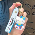 Cute Hello Kitty soft rubber keychain pendant with blue strap and gold clasp - Hello Kitty-Colorful Striped Skirt