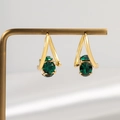 Luxury gold geometric earrings with emerald green gemstones on a brass display stand - Triangle Inlaid Green Gemstone (E1823 Green) / 925 Silver Needle / Gold/Green