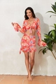 Detail van bloemen crop top met lange mouwen en strikband en rok met ruches voor strand - S / Oranjerood