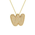 Macro detail of 18K gold plated letter W pendant with sparkling zircon inlays - Letter W / Gold