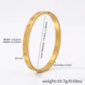 Detail of gold-plated stainless steel bangle showing heart engravings and inlaid zircon stones - Gold Heart Engraved Style (Z132)