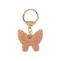 Detalle de llavero de mariposa oro rosa con cristales brillantes y aro metálico - Champán