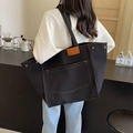Classic black canvas tote bag with textured stripes and large front pocket on shoulder - Canvas Contrast Stitch / Black