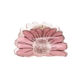 Close-up of pink translucent acrylic flower hair claw with fine glitter and gold spring - Daisy 5cm