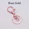 Detail of rose gold lobster clasp keychain set with swivel link and flat split ring - Rose Gold
