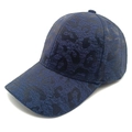 Detailed view of the dark blue leopard embossed fabric and curved brim of the baseball cap - M (56-58cm) / Navy Blue