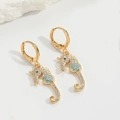 Elegant gold seahorse drop earrings with white zircon and blue floral gemstone accents - Blue Zirconia Seahorse (ES2641)