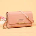 Pink lady crossbody phone bag in pebble grain faux leather with golden zippers - Pink
