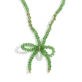 Green crystal faceted bead necklace with handmade bow pendant and golden steel accents - Light Green Transparent