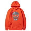Orange Halloween hoodie with a sparkling rhinestone skull graphic on the front - Orange