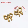Colgantes de lazo dorado de acero inoxidable para pendientes y joyería artesanal - 5 Unidades/Paquete / Dorado