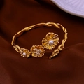 Detailed view of vintage gold textured open cuff with carved flowers and pearls - Gold Carved Flower Pearl Bangle (48#)