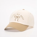 Two-tone baseball cap in cream and khaki with Doing My Best embroidery and bow design - Off-White/Dark Khaki