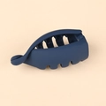 Matte dark blue banana clip hair claw for high ponytail styling on beige background - Navy Blue