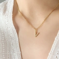 Gold plated titanium necklace featuring a sparkling crystal-encrusted letter V pendant - Letter V / Gold