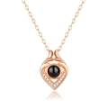 Rose gold necklace with heart pendant featuring a black projection stone and zircon accents - Small Heart Rose Gold