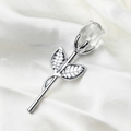 Elegant silver metal rose brooch with clear crystal bud on white silk fabric background - Silver Stem White Flower Loose