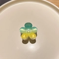 Detail of gradient yellow and green plumeria hair claw clip with glossy acrylic finish - Colorful Plumeria Blue Yellow