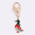 Close-up of a cartoon wild duck enamel keychain with a heart-shaped golden clasp on white - Black Head Duck