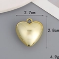 Detail view of a gold heart pendant showing dimensions of 2.7cm by 2.8cm and 4.9g weight - 27mm*28mm 3D Heart / Gold