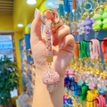 Hand holding a pink and white rhinestone mushroom keychain with a crystal strap - Full Drill Mushroom-Pastel Pink