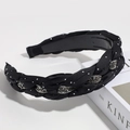 Detailed view of wide braided headband with crystals and non-slip interior teeth - Rhinestone Braided Black Elite