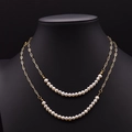 Collier double couche à maillons trombones dorés avec perles blanches élégantes - Collier sautoir multi-usage