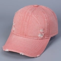 Close-up of distressed pink denim baseball cap showing frayed hole details and texture - M (56-58cm) / Pink
