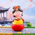 Miniature figurine of a lady in red and yellow hanfu holding a lotus on a red tumbler base - Tang Dynasty Maiden with Lotus Medium