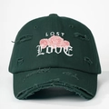 Detail of green distressed baseball cap with rose flower and LOST LOVE embroidery - One Size / Dark Green