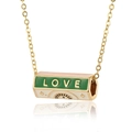 Detail view of gold hex pendant with green LOVE enamel and mystic eye motif - Gold-LOVE/Green & White Enamel