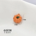 Detail view of 15mm orange pumpkin charm with green stem for DIY jewelry making - 4493# Pumpkin