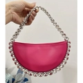 Detail of fuchsia sequin crescent bag featuring large crystal trim and top handle - Classic Rose Pink