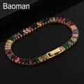 Detailed macro view of gold plated tennis bracelet with multicolor rectangle cut gemstones - Gold + Colorful Zircon