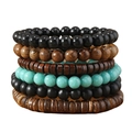 Macro shot of layered wooden and turquoise beads with natural textures on white background - Coconut Black Brown Turquoise (54)