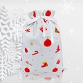 Close-up of white Christmas drawstring gift bag with festive holiday patterns and ribbon - 39*51cm White Background Candy Print