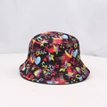 Reversible bucket hat with colorful graffiti prints and street style patterns in black - One Size (54-58cm) / Star