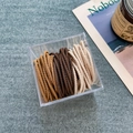 Set of elastic ribbed hair ties in brown, yellow, and beige within a clear storage box - 8# Yellow Spiral (50pcs Box)