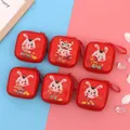Red square tinplate coin purse featuring cartoon rabbit and festive New Year patterns - Square Year of the Rabbit Style A