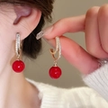 Close-up of red drop earrings with gold hooks and sparkling crystals on female ear - 27# Red - Rhinestone Bead Dangle (Earring Hook)