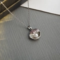 Silver necklace featuring a delicate pink shell rose pendant and a white pearl detail - Pink Shell Pearl Necklace 0378YF
